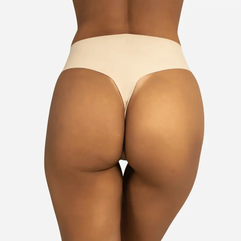 Tanga invisible anti-camel toe de tiro medio