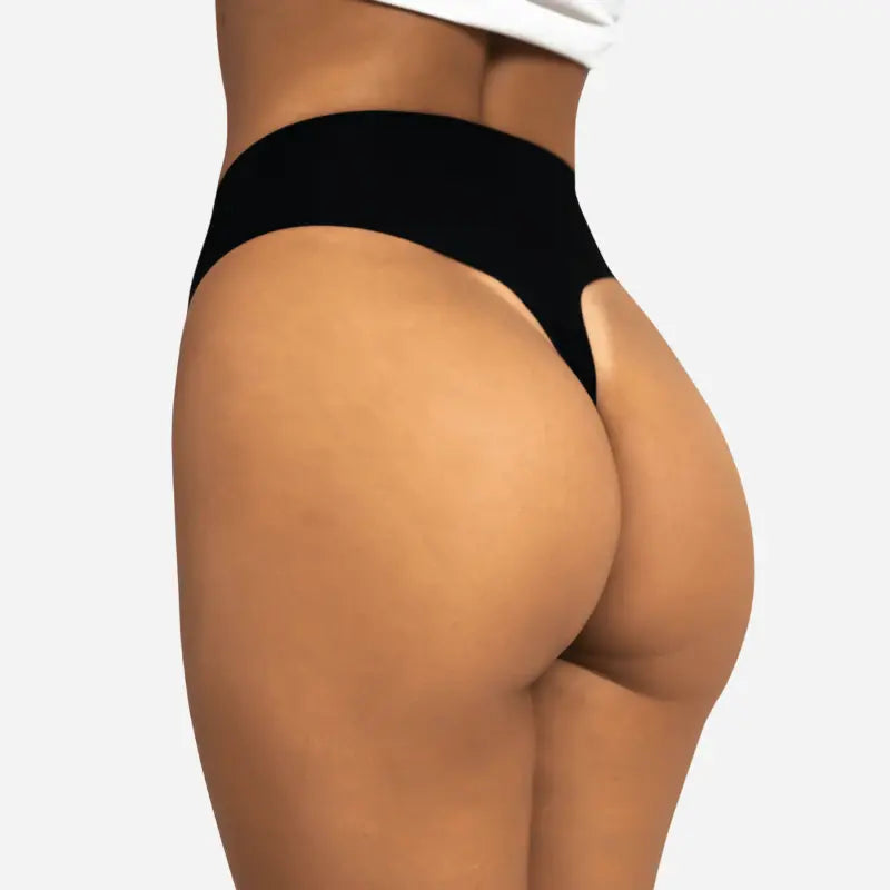 Tanga invisible anti-camel toe de tiro medio